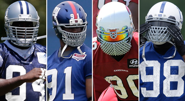 Robert Mathis (right) will not be allowed to wear this face mask for the season. 
